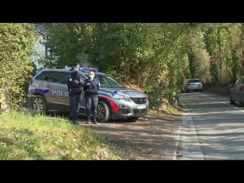 Police stand watch outside Dassault helicopter crash site