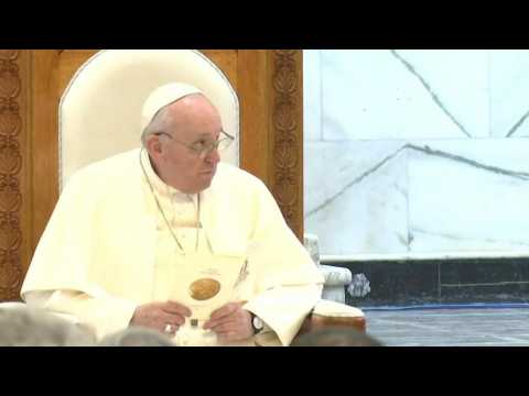 Pope arrives at church torched by IS in Iraq's Qaraqosh