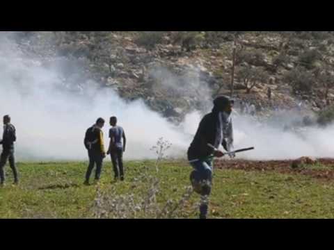 Clashes between Israeli forces and Palestinian protesters during demonstration in West Bank