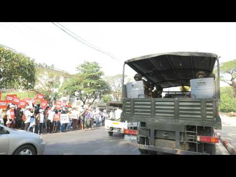 Soldiers and protesters face off outside Myanmar Central Bank