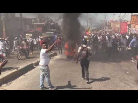 At least 1 dead, several injured in large Haiti protests