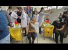 Health workers receive the Sputnik V vaccine in Tunisia