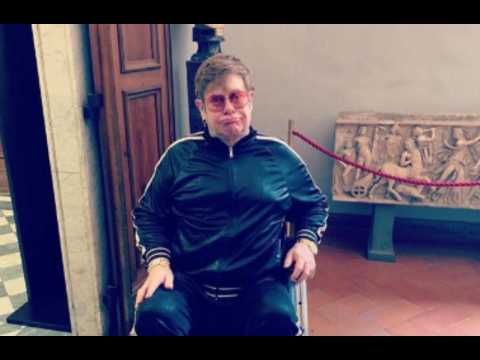 Sir Elton John sprains ankle