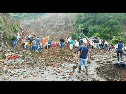 Locals search for survivors after landslide in southwest Colombia