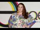 Tess Holliday wishes she loved body '100 pounds ago'