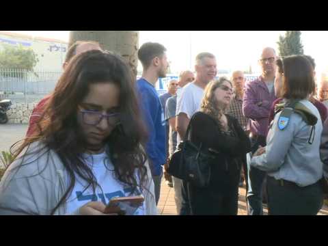 Israelis queue outside a polling station in Rosh Haayin
