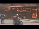 Venezuelan govt bus burns as protesters try to block road access - Label : AFPTV - First images - Category : News