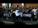 Usain Bolt races against a motorcycle taxi in Lima