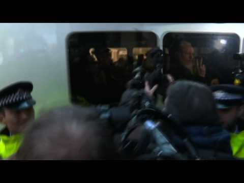 Julian Assange arrives in London court