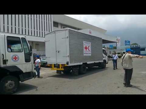 A caravan of humanitarian aid trucks arrives in Caracas