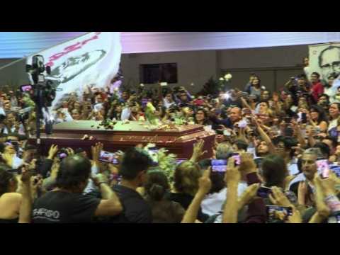 Coffin of Peru's ex-President arrives at his party's HQ