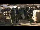 Kenya police fire teargas to clear market amid virus shutdown