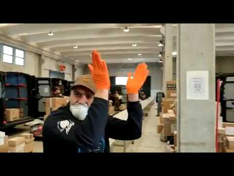 Coronavirus: UPS couriers in Bergamo break out in song while loading parcels