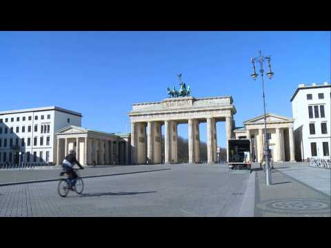 Berlin's Brandenburg Gate almost empty as Germany tightens measures over coronavirus spread