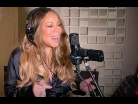 Mariah Carey performs Always Be My Baby with 'fan' blowing her hair