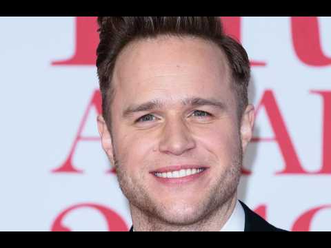 Olly Murs is 'so happy' in his relationship