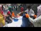 Volunteers in India give away free food to those in need during coronavirus pandemic