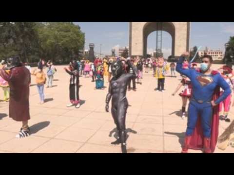 Superheroes march Mexico City for help amid COVID-19