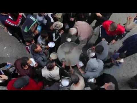 Palestinians get free soup during holy month of Ramadan