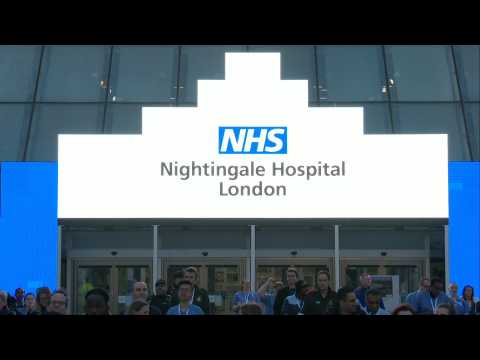 Medical workers at NHS Nightingale field hospital take part in weekly 'Clap for Carers'