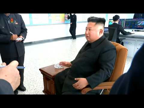 North Korea's Kim seen smoking during factory visit after weeks of health rumours