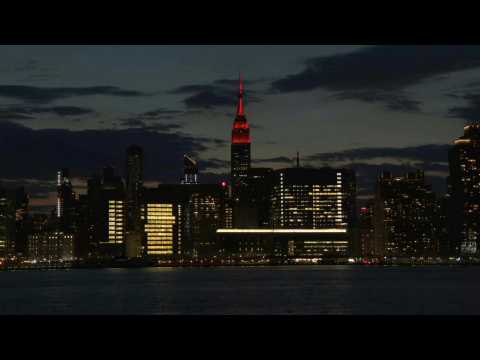 Empire state of mind: Iconic New York skyscraper shines red in tribute