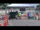 Coronavirus: Cars line up at testing site in Florida as restrictions are lifted