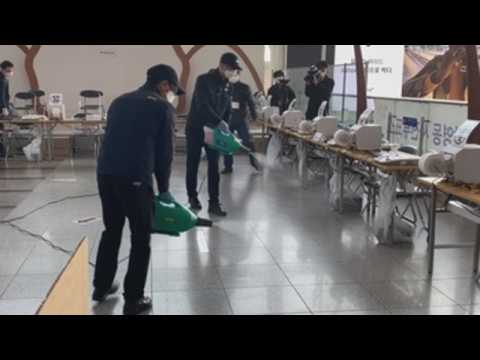 South Korean authorities disinfect polling stations for upcoming legislative elections