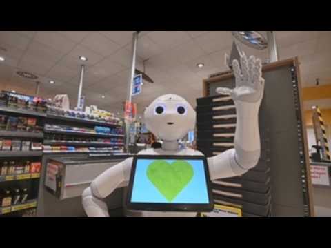 A robot helps to maintain safe distances in a German supermarket