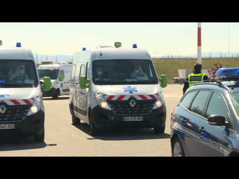 Coronavirus: ambulances tranporting infected patients arrive at Mulhouse airport
