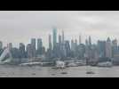 Images of Manhattan's skyline with USNS Comfort docked at Pier 90