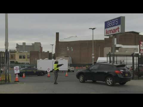 People arrive for testing at drive-through Covid-19 facility in minority area in Brooklyn