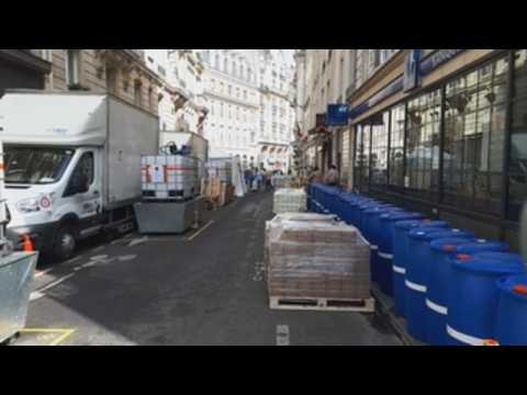 French pharmacist sets up hand gel lab in Paris street