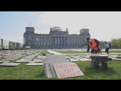 Climate activists protest in front of German Parliament