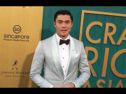 Henry Golding's dog bites another pooch