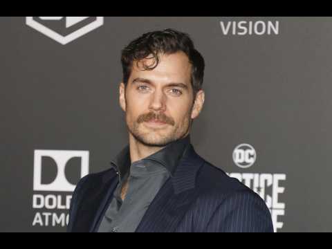 Henry Cavill laps up taking his shirt off on screen
