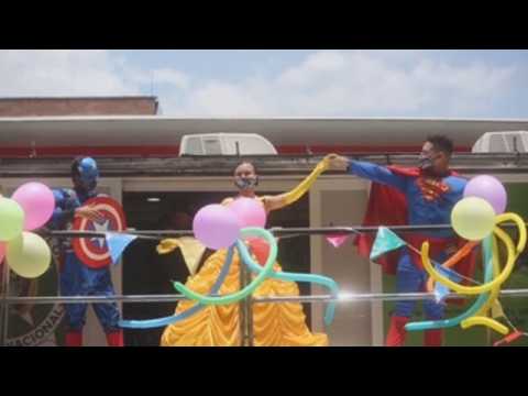 Colombian cops dress up as superheroes to celebrate Children's Day