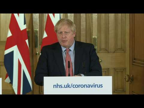 UK: Boris Johnson asks people with covid-19 symptoms to 'stay at home'