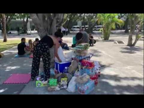 Cancun residents bring food, water to stranded tourists