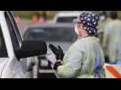 California health workers carry out Covid-19 tests in cars