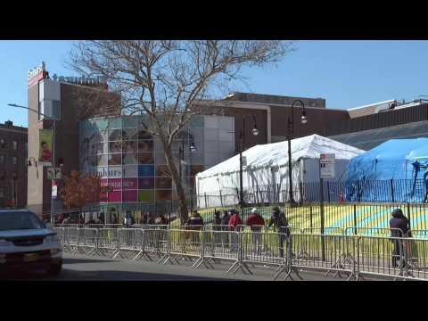 Coronavirus: people form long line for testing at NYC hospital
