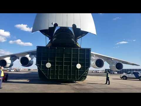 Russian plane with supplies for virus fight arrives in US