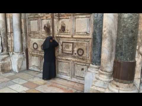 Holy Thursday mass held behind closed doors in Jerusalem