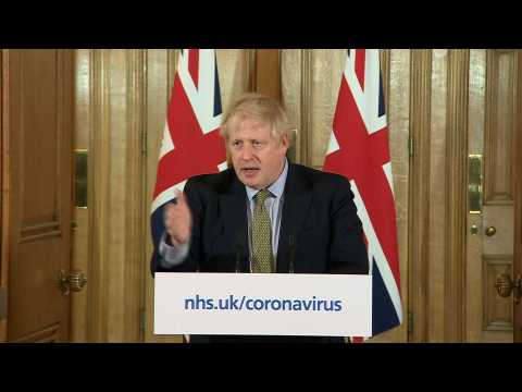 Boris Johnson says UK to close schools as coronavirus deaths rise