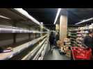 French shoppers raid supermarket shelves as coronavirus fears grow