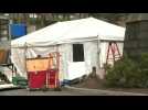 Workers build tent for coronavirus testing outside Brooklyn hospital