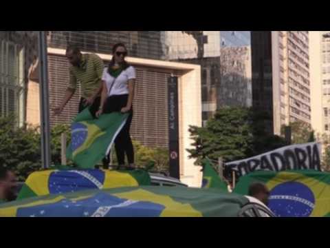 Bolsonaro joins anti-lockdown rally in Brasilia