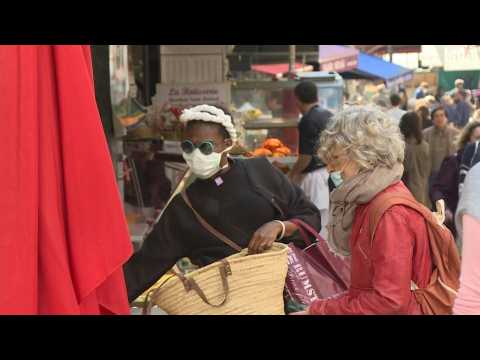 Parisians go shopping on 34th day of coronavirus lockdown