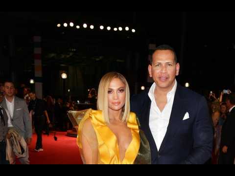 Jennifer Lopez and Alex Rodriguez discussing options for wedding plans