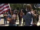 Los Angeles: Protesters wave US flags, honk against stay-home order